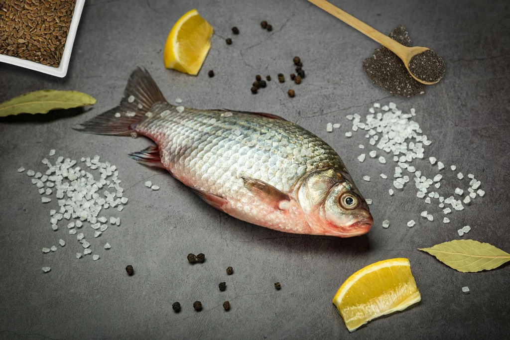 Omega-3 rich foods including fatty fish, chia seeds, and walnuts for heart, brain, and overall health benefits